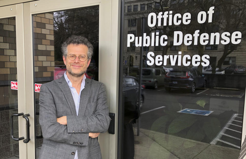 FILE - In this photo taken April 12, 2019 photo, Marc Brown, a lawyer with Oregon's Office of Public Defense Services-Criminal Appeals Section, poses in Salem, Ore. Oregon's attorney general is telling the U.S. Supreme Court that Oregon's criminal justice system would be "overwhelmed" if the nation's highest court rules that nonunanimous jury verdicts are unconstitutional. (AP Photo/Andrew Selsky, File)