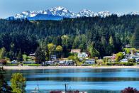 <p>Poulsbo was founded in the 1880s by a Norwegian immigrant, Jørgen Eliason. Ever since, it's been known as "<a href="https://www.smithsonianmag.com/travel/ten-american-towns-feel-europe-180975340/" rel="nofollow noopener" target="_blank" data-ylk="slk:Little Norway on the Fjord" class="link ">Little Norway on the Fjord</a>." Everything from the architecture to the beer halls to the annual Viking Festival is inspired by Scandinavian culture. </p>