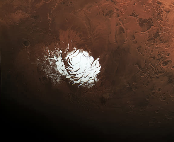 The icy south pole of Mars takes center stage in this amazing close up from a larger photo of the Martian south pole and cratered Hellas Basin region captured by the European Space Agency's Mars Express orbiter.