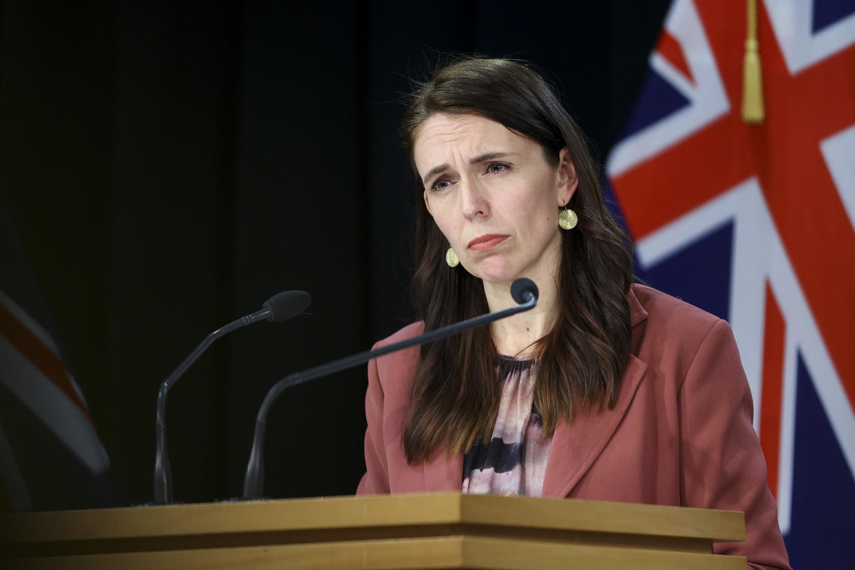 WELLINGTON, NEW ZEALAND - AUGUST 17: Prime Minister Jacinda Ardern looks on during a press conference at Parliament on August 17, 2021 in Wellington, New Zealand. Auckland and Coromandel will go into level-4 lockdown for seven days - and the rest of the country for three days - after a positive COVID-19 case was confirmed in the community in Auckland. The lockdown restrictions will come into effect at 11:59 tonight. The person traveled to Coromandel over the weekend. New Zealand health officials are investigating the source of the new positive COVID-19 case and are yet to confirm whether it is the highly contagious Delta variant of the coronavirus. The last case of community transmission was reported in New Zealand on February 28 2021. (Photo by Hagen Hopkins/Getty Images)