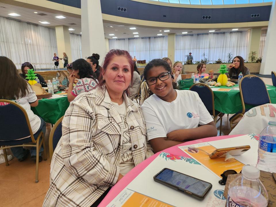 From left, Rebecca Corral and her granddaughter enjoy spending time together at The Laura W. Bush Institute for Women’s Health's Girl Power: Girls in Real Life seminar, Thursday evening in the Amarillo Civic Center Grand Plaza.