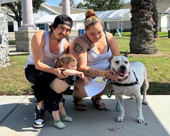 Cinderella, a 6-year-old brown-and-white female mixed pit bull, spent more time - 1,139 days - than any of the 105 dogs located at the Society for the Prevention of Cruelty to Animals' facility in Long Beach. She was adopted on Thursday by a Wilmington family.