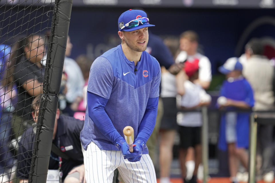 Chicago Cubs' Nico Hoerner practices during a training session ahead of the baseball match against St. Louis Cardinals at the MLB World Tour London Series, in London Stadium. (AP Photo/Kin Cheung)