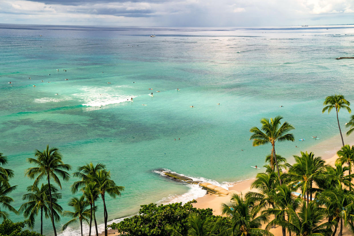 The normally packed Wakiki Beach on Oct. 22 in Honolulu. Oct. 15 was the start of a new traveler testing program, with thousands of people expected to arrive to the state