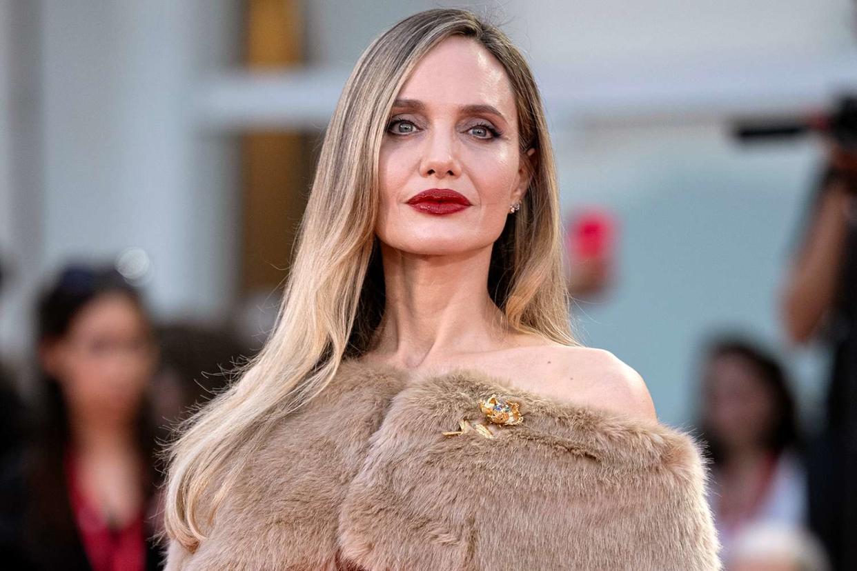 <p>Alessandro Levati/Getty</p>  Angelina Jolie attends the red carpet for "Maria" during the 81st Venice International Film Festival.