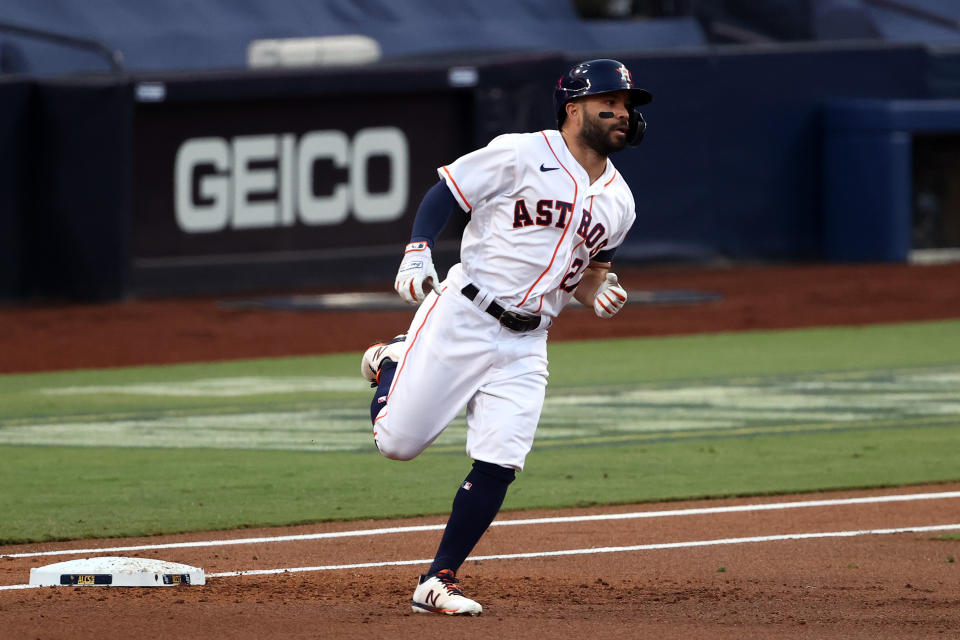 SAN DIEGO, CALIFORNIA - OCTOBER 14: Jose Altuve #27 of the Houston Astros rounds the bases after hitting a solo home run against Tyler Glasnow #20 of the Tampa Bay Rays during the first inning in Game Four of the American League Championship Series at PETCO Park on October 14, 2020 in San Diego, California. (Photo by Ezra Shaw/Getty Images)