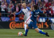 United States midfielder Michael Bradley (4) dribbles out of a tackle by Guatemala midfielder Rodrigo Saravia (22)in the first half of the game during the semifinal round of the 2018 FIFA World Cup qualifying soccer tournament at MAPFRE Stadium. Trevor Ruszkowski-USA TODAY Sports