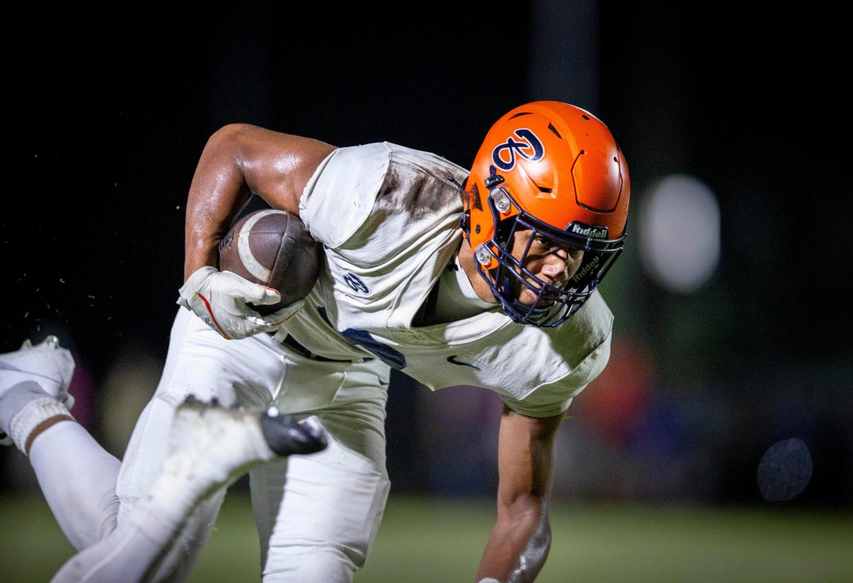 Benjamin wide receiver Amaree Williams catches a pass for a touchdown over Cardinal Newman during their football game on October 20, 2023 in West Palm Beach, Florida.