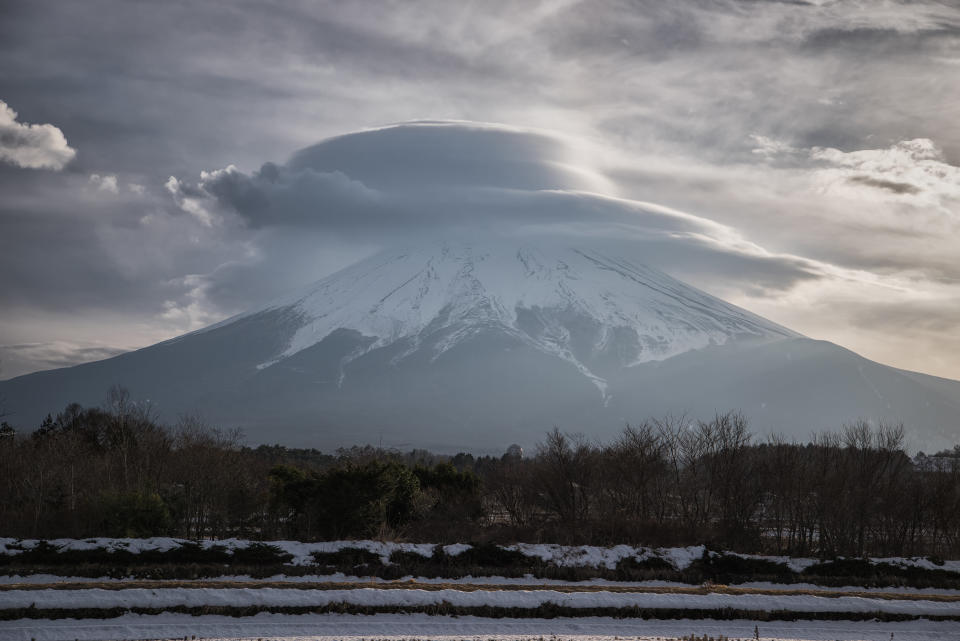 The photograph was taken in Fujiyoshida, Yamanashi prefecture. Fujiyoshida is considered as one of the best places to admire the beauty of Mount Fuji and the gateway for climbing Mt. Fuji via the Yoshida trail, the most popular trail to the summit.