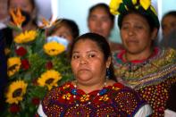 Guatemalan migrant Juana Alonso Santizo arrives at La Aurora international airport in Guatemala City, Sunday, May 22, 2022. Alonso Santizo who was imprisoned in northeastern Mexico for seven years while trying to migrate to the United States and who was arrested on kidnapping charges was released on Saturday, May 21, after numerous organizations and even Mexican President Andres Manuel Lopez Obrador interceded on her behalf. (AP Photo/Moises Castillo)