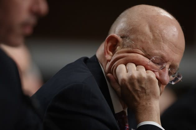 Director of National Intelligence James Clapper listens to questions on Capitol Hill. Evan Vucci / AP