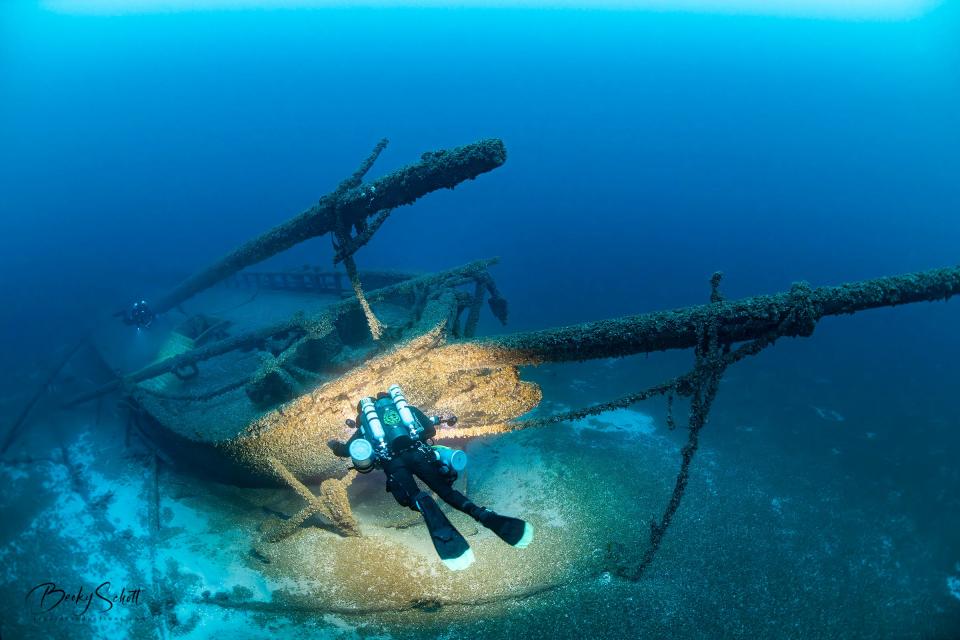 A diver explores the shipwreck Gallinipper in the Wisconsin Shipwreck Coast National Marine Sanctuary.