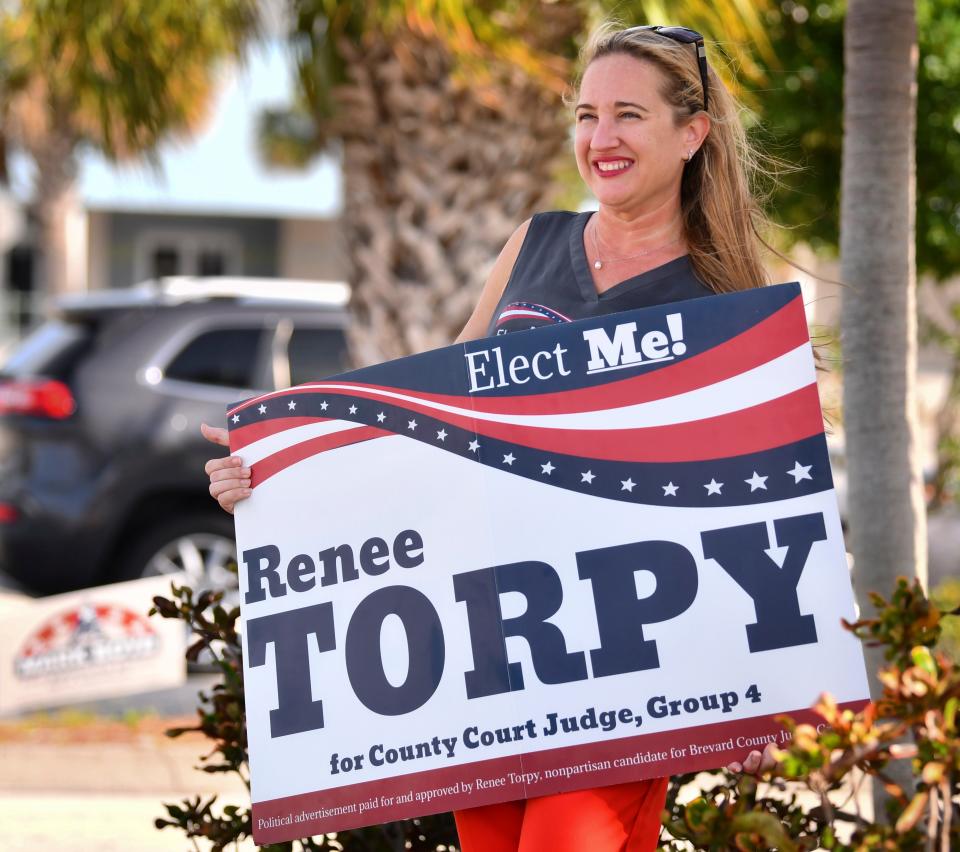 Brevard County Judge candidate Renee Torpy was out waving to voters at the Schechter Community Center in Satellite Beach on Election Day. Torpy lost to opponent Kimberly Musselman, despite having the support of Brevard County Sheriff Wayne Ivey.