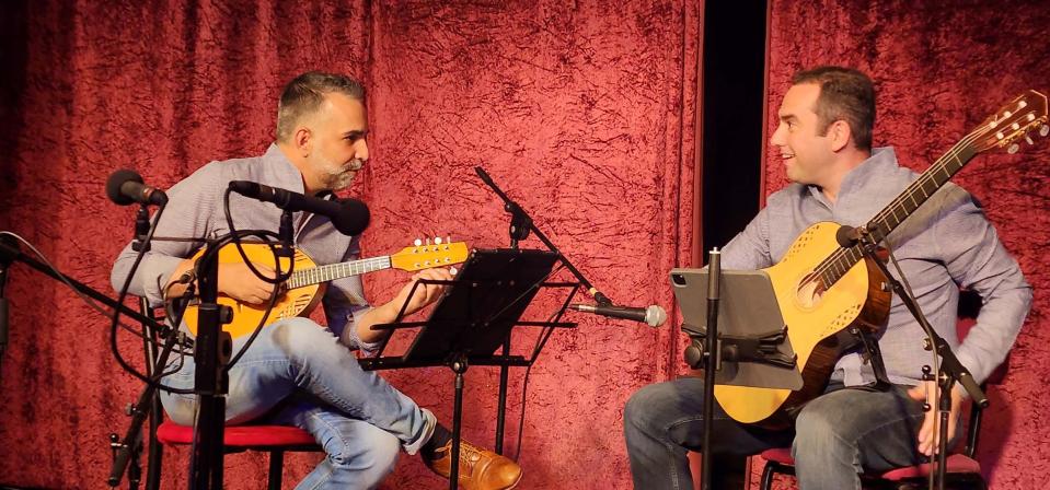 Adam Levin, right, director of the URI Guitar Festival, performs with Israeli mandolin virtuoso Jacob Reuven.