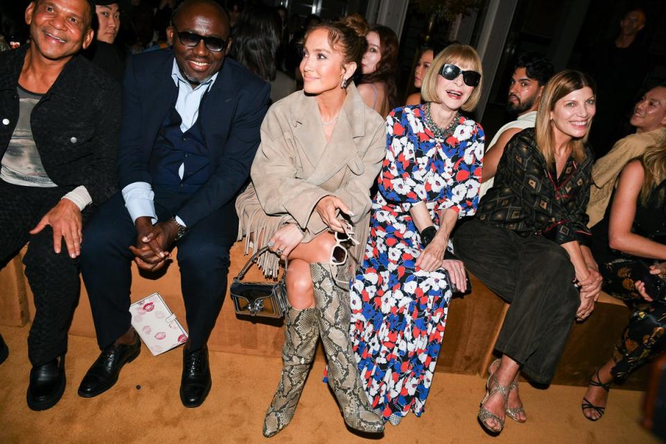 Jennifer Lopez (centre) joins Edard Enninful and Anna Wintour on the front row (Billy Farrell/BFA.com)