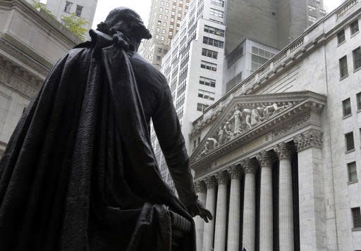 FILE - In this Oct. 2, 2014, file photo, the statue of George Washington on the steps of Federal Hall faces the facade of the New York Stock Exchange. Stocks are opening moderately higher on Wall Street, Monday, Aug. 29, 2016, as the market comes off three days of losses. (AP Photo/Richard Drew, File)