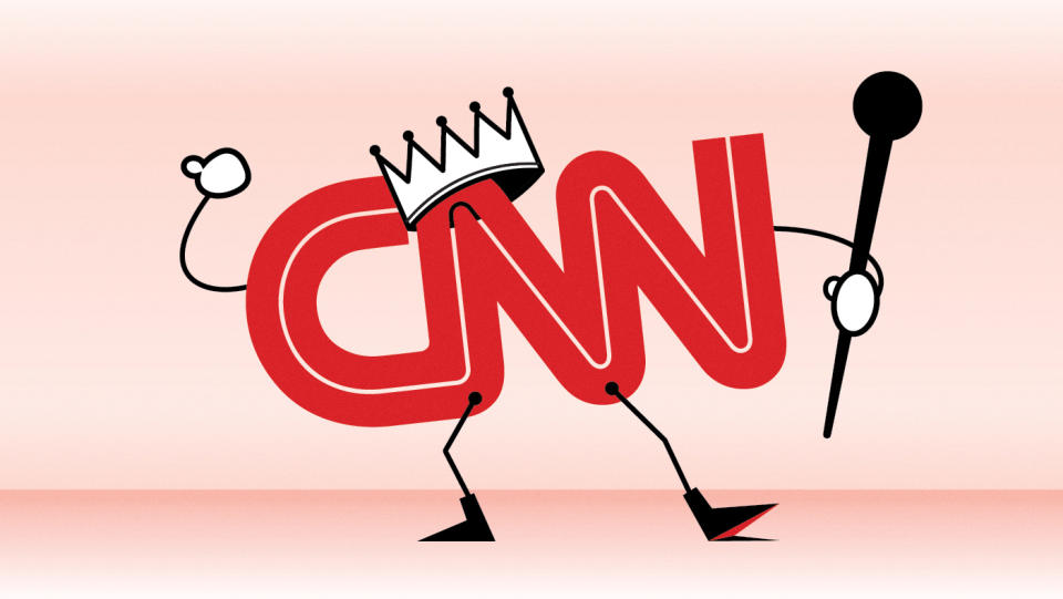 anthropomorphized CNN logo wearing a crown and waving a scepter