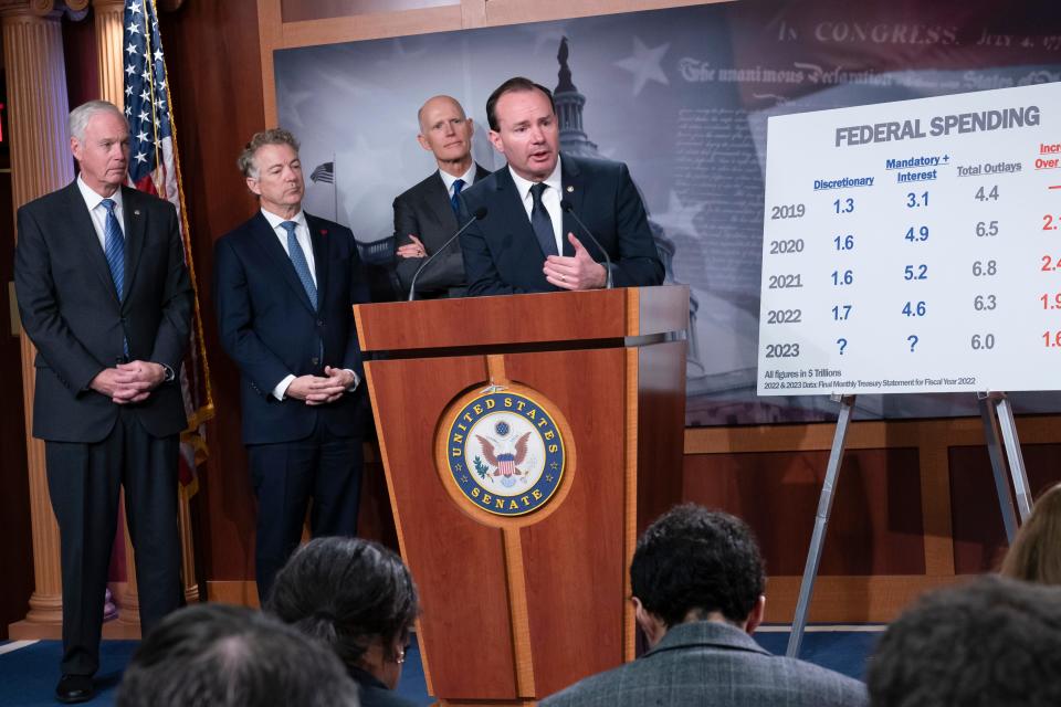 A group of Republican senators, from left, Sen. Ron Johnson, R-Wis., Sen. Rand Paul, R-Ky., Sen. Rick Scott, R-Fla., and Sen. Mike Lee, R-Utah, criticize Democratic spending and the current process to fund the government, during a news conference at the Capitol in Washington, Wednesday, Dec. 14, 2022.