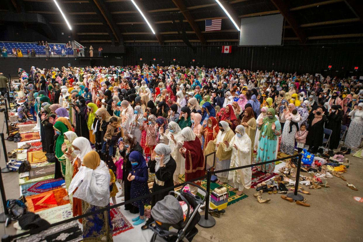 Many community members gather to celebrate Eid al-Fitr, which marks the end of Ramadan, on May 2, 2022, at the Dome Arena in Henrietta, New York.