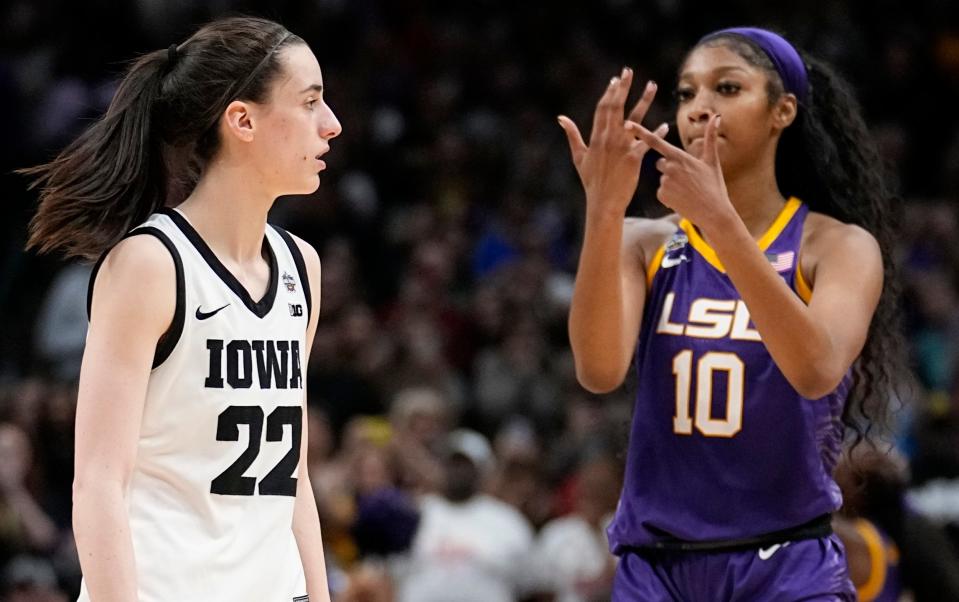 Angel Reese reacts for Iowa's Caitlin Clark during the second half of the NCAA Women's Final Four championship basketball game on April 2, 2023, in Dallas.  Iowa and LSU prepare to meet again in a rematch of the 2023 national championship game on Monday, April 1, 2024