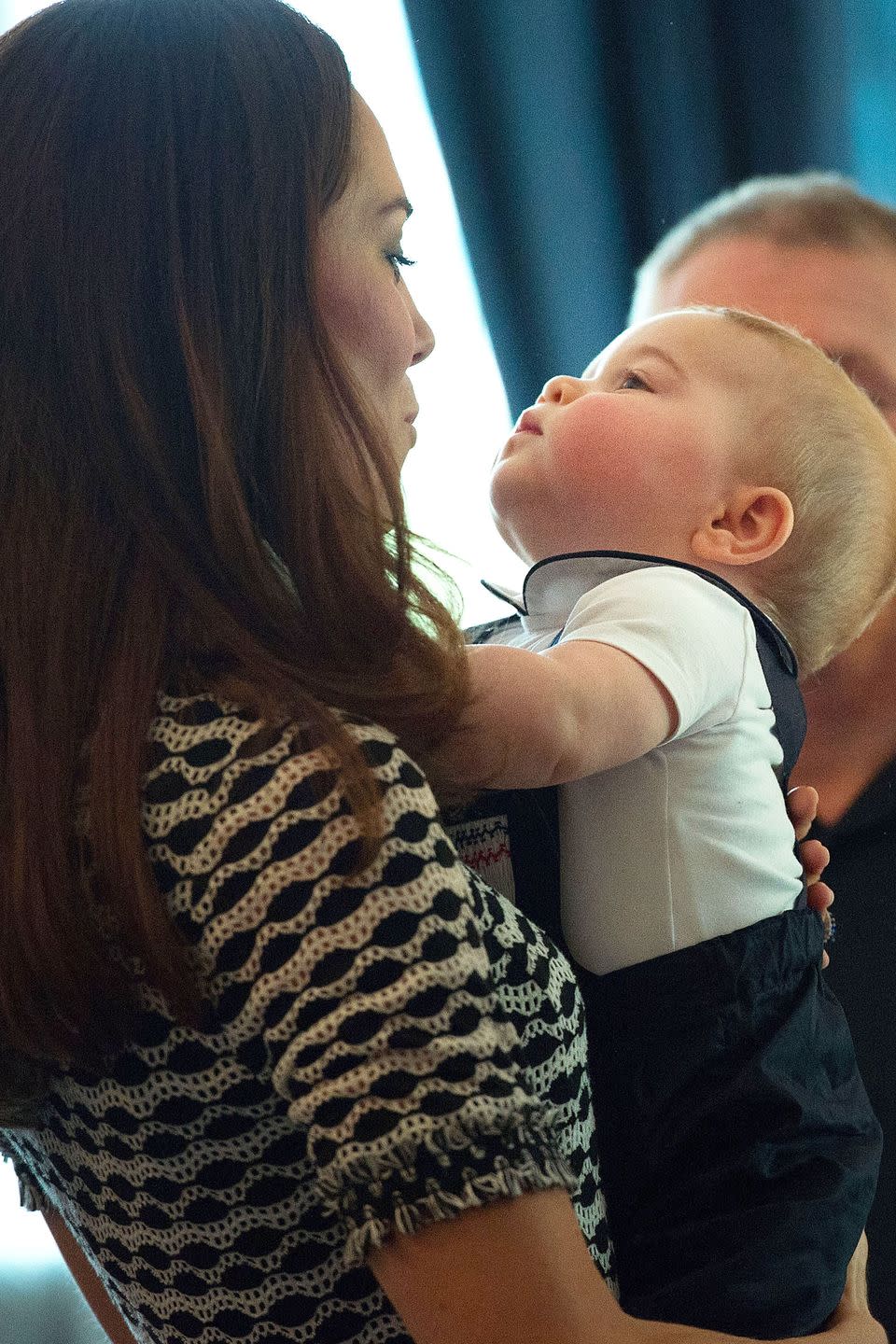 <p>Duchess Kate makes a face at baby Prince George while at an event in Wellington, <span class="redactor-unlink">New Zealand</span>. </p>