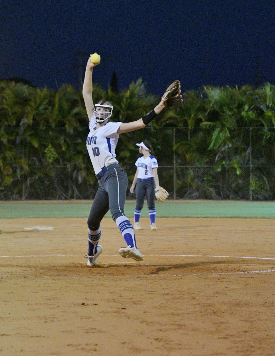 Wellington’s Jordan White delivers a pitch in the third inning of Thursday’s district finals game against Palm Beach Gardens. She struck out four in the shutout victory on May 5, 2022.
