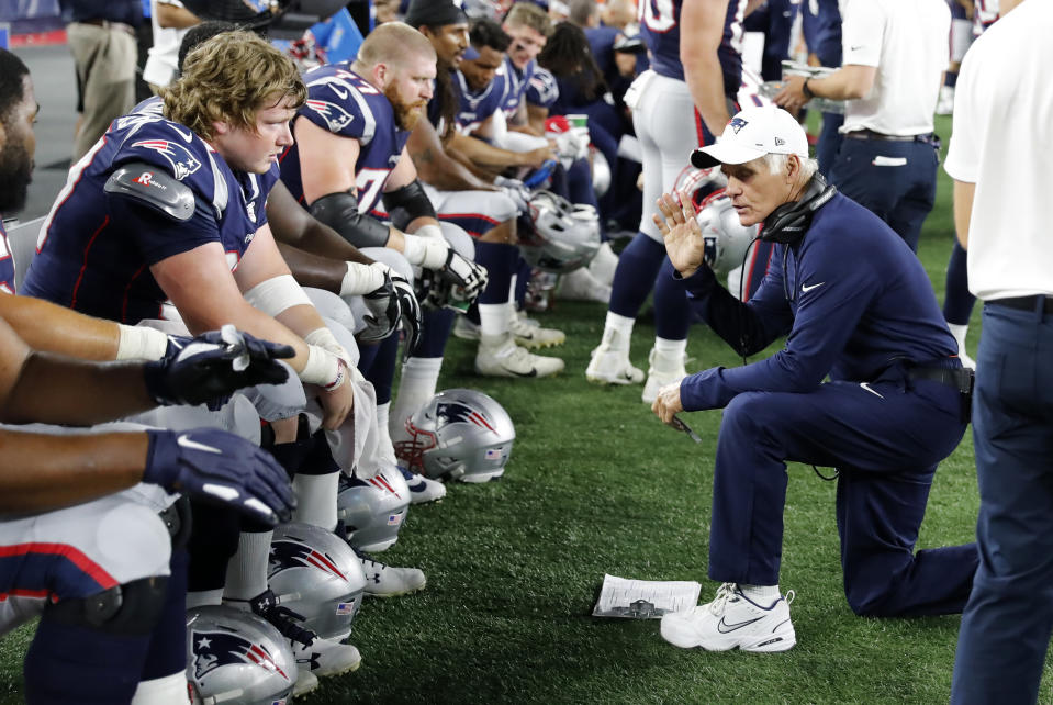 New England Patriots offensive line coach Dante Scarnecchia, right, is retiring. (Fred Kfoury III/Icon Sportswire via Getty Images)