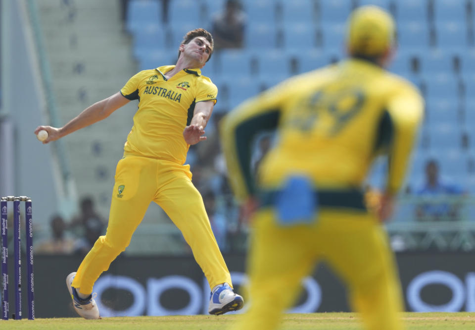 Australia's captain Pat Cummins bowls a delivery during the ICC Men's Cricket World Cup match between Australia and Sri Lanka in Lucknow, India, Monday, Oct. 16, 2023. (AP Photo/Rajesh Kumar Singh)