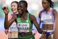 Tobi Amusan, of Nigeria, reacts after winning the women's 100-meter hurdles semifinal at the World Athletics Championships on Sunday, July 24, 2022, in Eugene, Ore. (AP Photo/Ashley Landis)