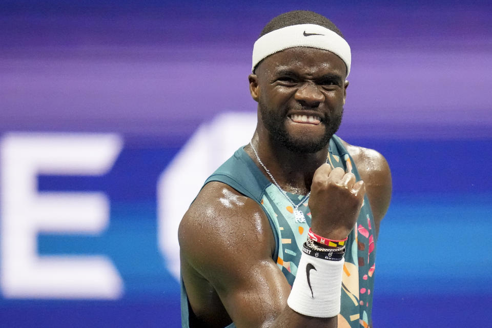 Frances Tiafoe, of the United States, reacts during a match against Ben Shelton, of the United States, during the quarterfinals of the U.S. Open tennis championships, Tuesday, Sept. 5, 2023, in New York. (AP Photo/Charles Krupa)