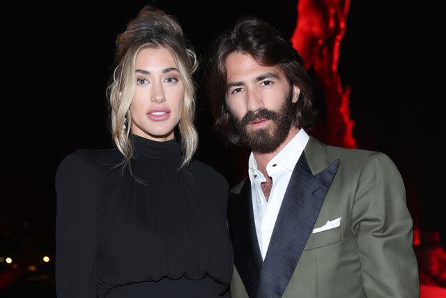 <p>Daniele Venturelli/Getty</p> Jessica Serfaty and Leonardo Maria del Vecchio attend the front row during LuisaViaRoma & British Vogue Runway Icons at Piazzale Michelangelo on June 14, 2023 in Florence, Italy.