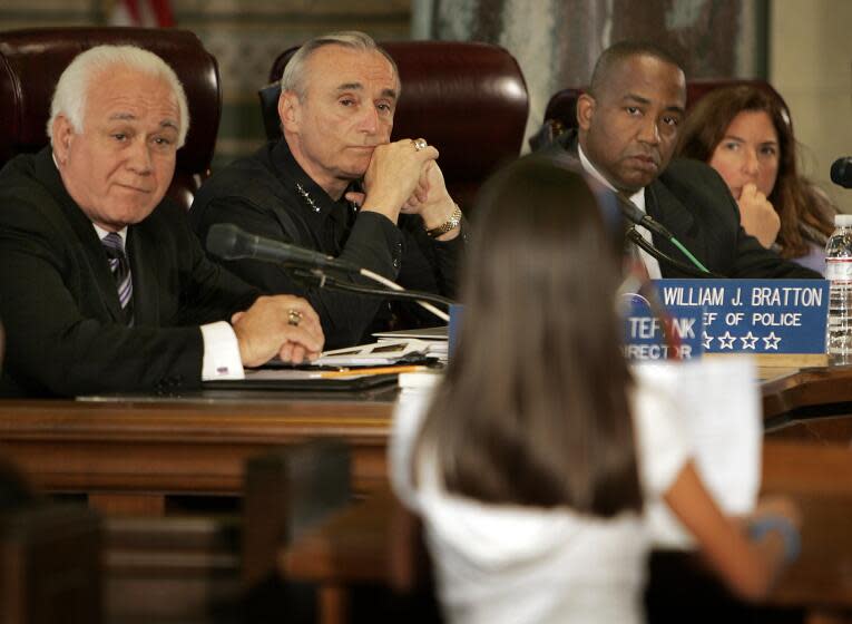 LOS ANGELES, CA. Members of the Police Commission (L–R) Richard Tefank, Chief William J. Bratton, Andre Birotte Jr., and Shelley Freeman listen to Karla Vargas a 10–year–old 5th grader explain what she witnessed when she was at the May Day MacArthur Park rally with her Mother, younger brother and Grandmother. Karla is one of the plaintiffs in a case filed against the LAPD. The Police Commission meeting agenda included the LAPD's report on the department's response to the May Day rally in MacArthur Park. (Photo by Al Seib/Los Angeles Times via Getty Images)