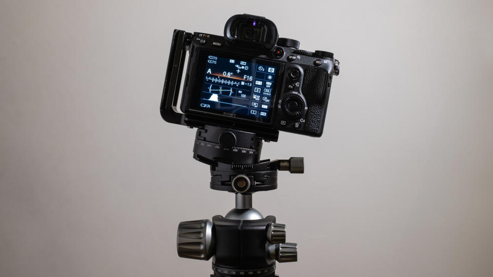Sony A7 RIII attached to a Leofoto LH-40GR Ball Head in front of a white wall