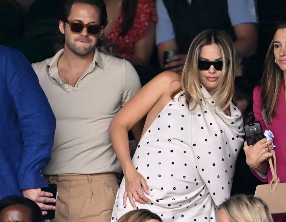 Margot Robbie and Tom Ackerley, last July at Wimbledon