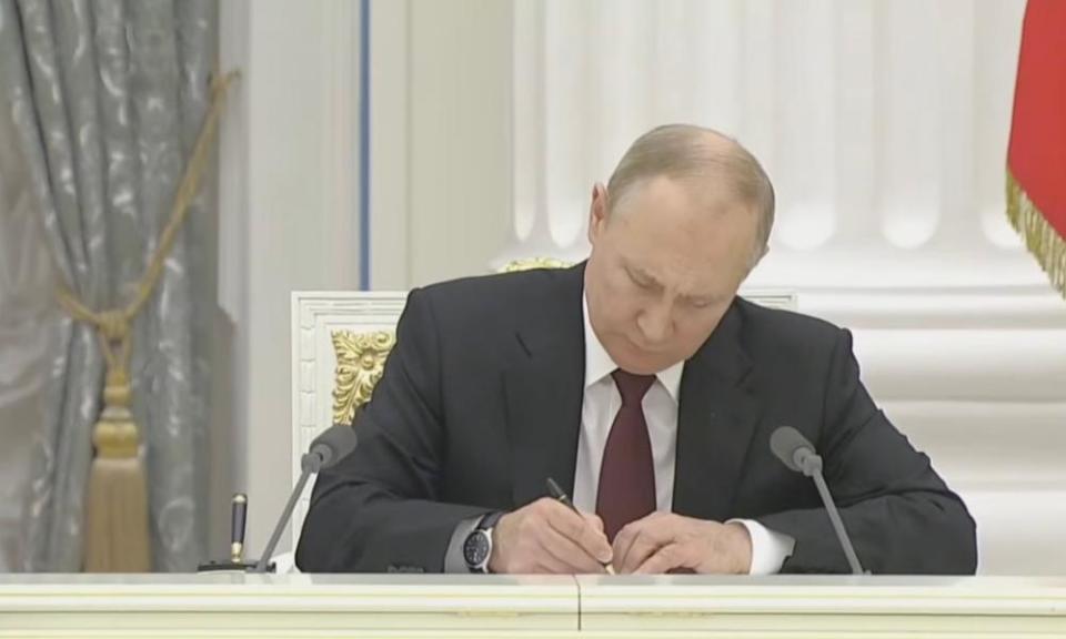 Putin signs cooperation agreements with the separatist republics of Luhansk and Donetsk at Kremlin on Monday.