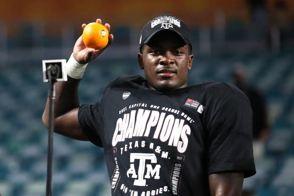 Jan 2, 2021; Miami Gardens, FL, USA; Texas A&M Aggies running back Devon Achane (6) throws out oranges after winning the Orange Bowl against the North Carolina Tar Heels at Hard Rock Stadium. Mandatory Credit: Sam Navarro-USA TODAY Sports