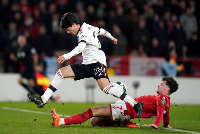 Manchester United’s Facundo Pellistri is challenged by Nottingham Forest’s Neco Williams