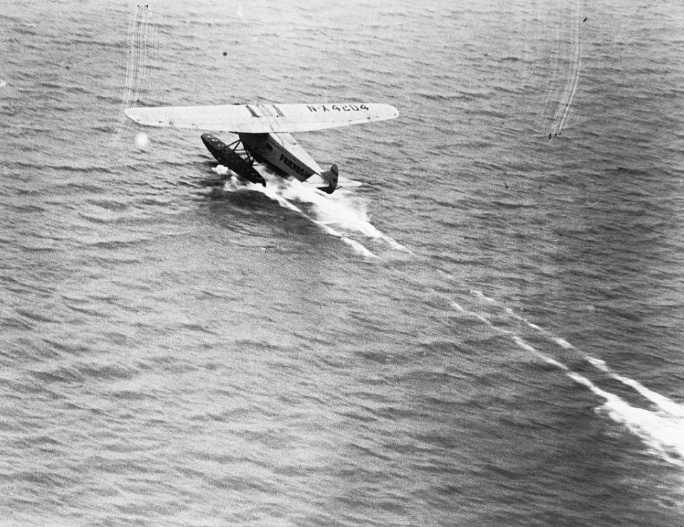 earhart's plane taking off from the water