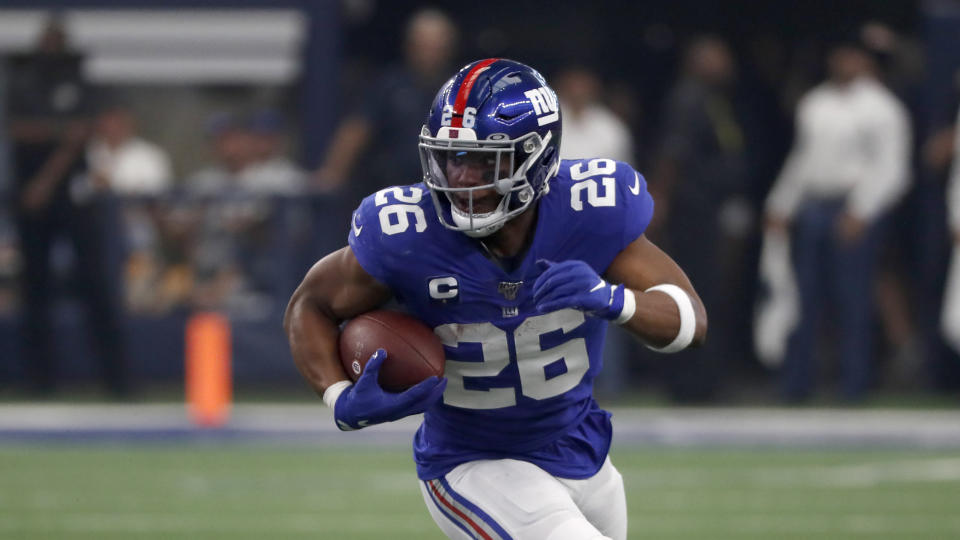 New York Giants running back Saquon Barkley (26) carries the ball during a NFL football game against the Dallas Cowboys in Arlington, Texas, Sunday, Sept. 8, 2019. (AP Photo/Roger Steinman)