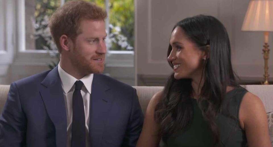 Harry and Meghan during their engagement interview with the BBC's Mishal Husain. (BBC)