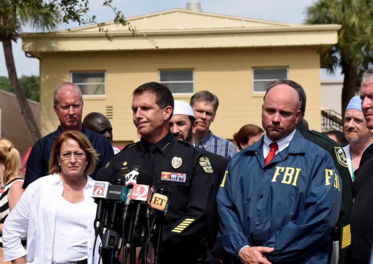 From left, Orange County Mayor Teresa Jacobs, Orlando police chief John Mina and FBI agent Ron Hopper speak at a news conference on Sunday after a deadly shooting attack at Pulse nightclub in Orlando. (Photo: Kevin Kolczynski/Reuters)