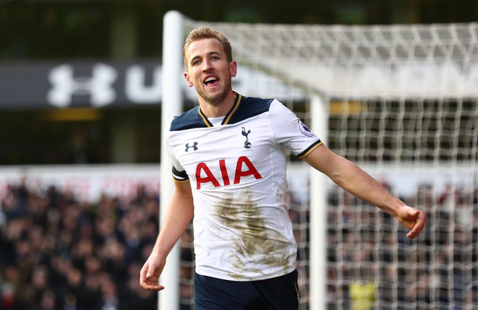 <p>Harry Kane celebrates making it 4-0</p>