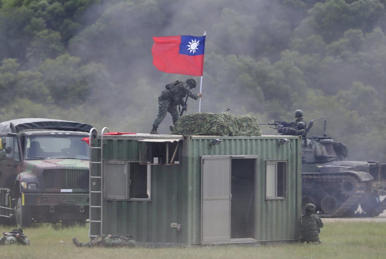 A soldier holds Taiwan's national flag during military drills. <a href="https://newsroom.ap.org/detail/TaiwanDrill/c91b47b9541d404983d22810e48f1f35/photo" rel="nofollow noopener" target="_blank" data-ylk="slk:AP Photo/Chiang Ying-ying;elm:context_link;itc:0;sec:content-canvas" class="link ">AP Photo/Chiang Ying-ying</a>