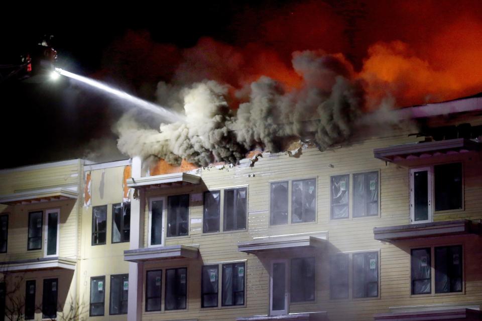 Fire crews battle a fire Feb. 8, 2022, at the Canton Apartments, 6161 N Western Ave. in Oklahoma City.