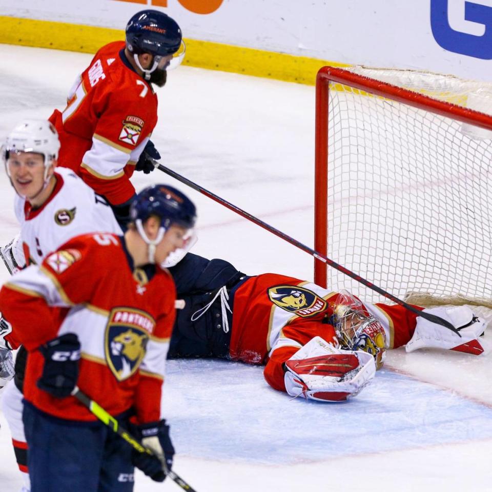 Florida Panthers goalie Spencer Knight (30) reacts after giving up a point during the third period of an NHL game against the Ottawa Senators at FLA Live Arena in Sunrise, Florida, on Tuesday, December 14, 2021. The Panthers lost to the Senators 8-2, allowing the biggest loss of the season.