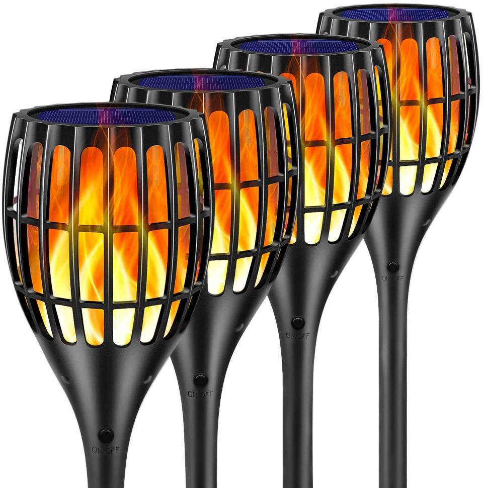 Four Ollivage torch-style solar lights