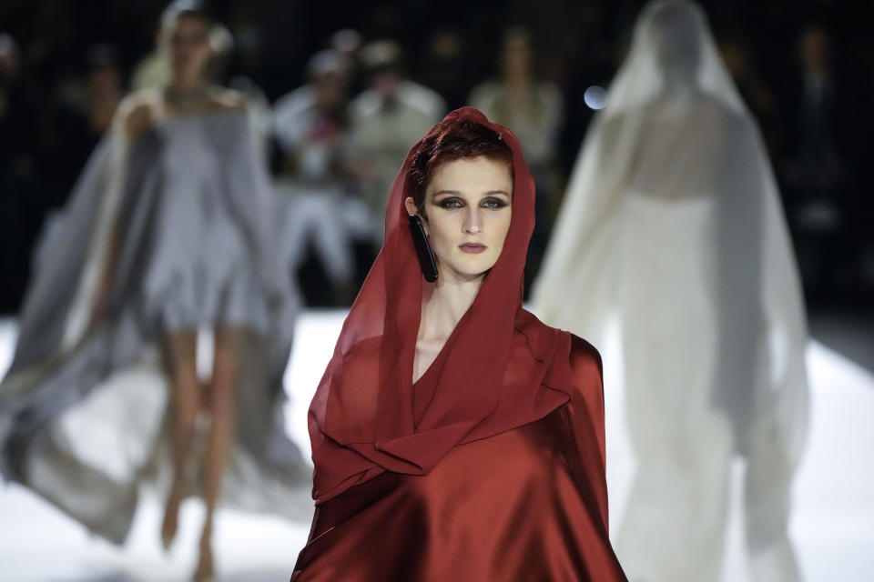 A model wears a creation for the Stephane Rolland Spring-Summer 2022 Haute Couture fashion collection, in Paris, Tuesday, Jan. 25, 2022. (AP Photo/Francois Mori)