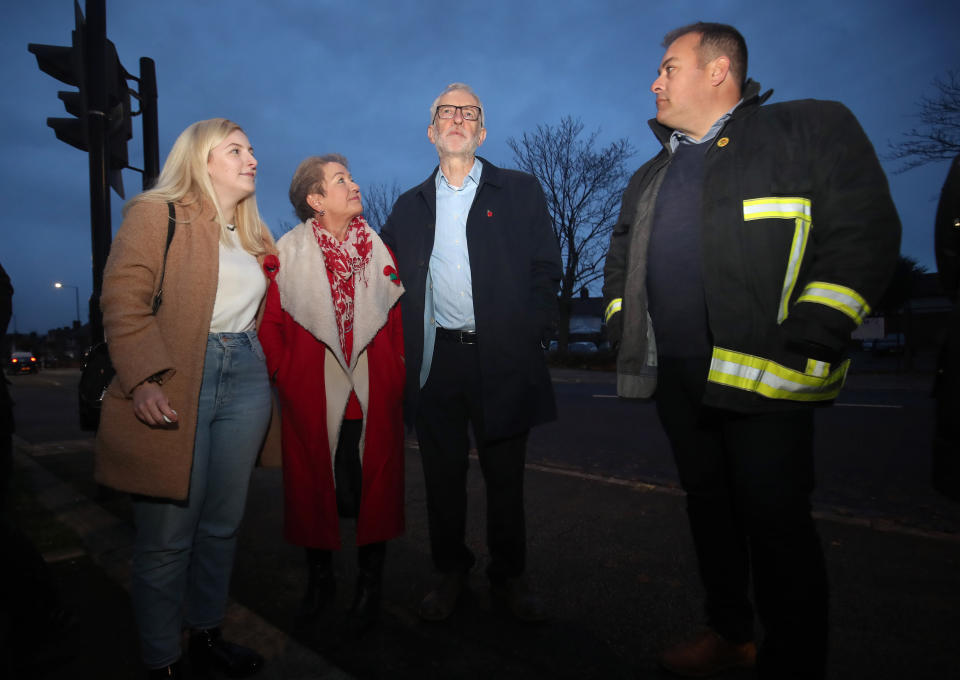 Labour leader Jeremy Corbyn with Sophie Wilson PPC for Rother Valley (left), Rosie Winterton (2nd left) and Neil Carbutt FBU South Yorkshire brigade secretary (right) during a visit to Conisborough, South Yorkshire, where he met residents affected by flooding.