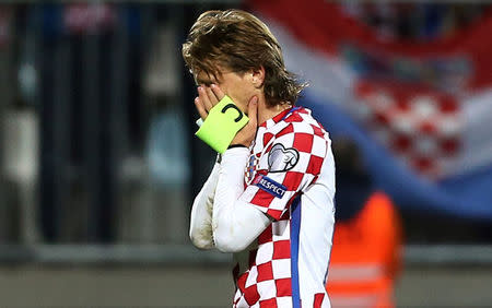 Croatia's Luka Modric looks dejected after the match REUTERS/Antonio Bronic