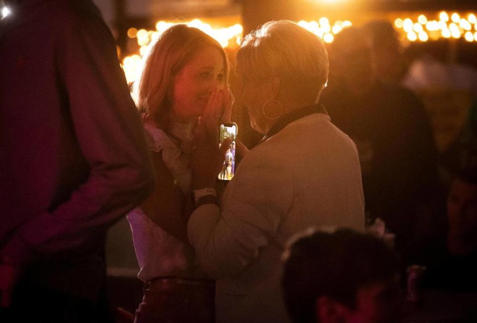 Fort Worth mayoral candidate Mattie Parker, left, talks to Fort Worth Mayor Betsy Price while waiting for election results on Saturday, May 1, 2021. Parker will face Deborah Peoples in a June runoff election for mayor.